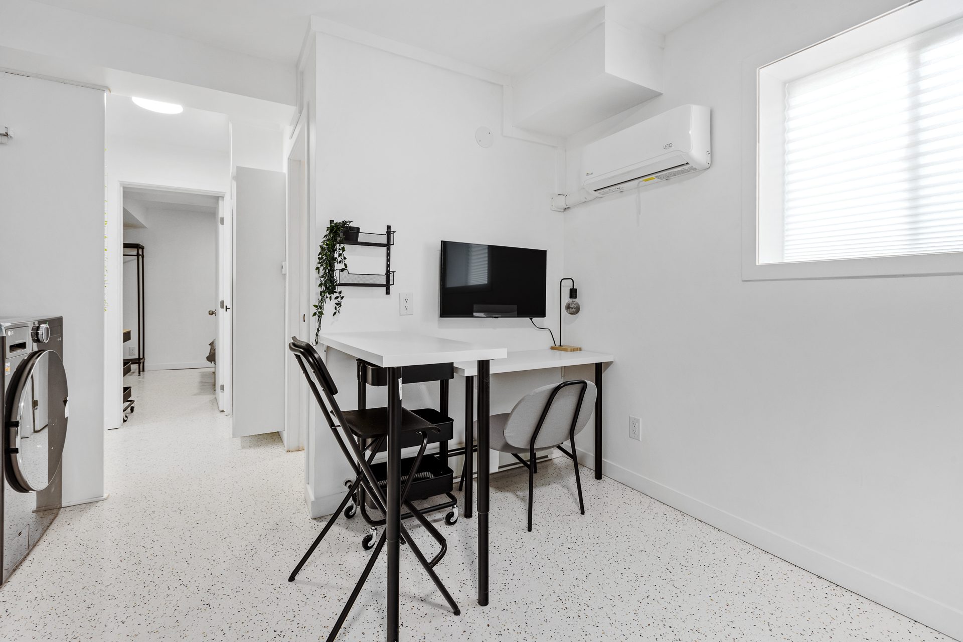 Unit 06 dining desk area beside the bedroom hall